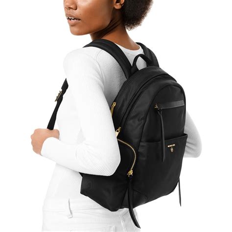 michael michael kors slim zip nylon backpack|Michael Kors nylon belt bag.